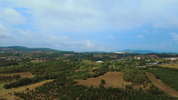 Steep green mountains, deep forest and mountain road, beautiful valley