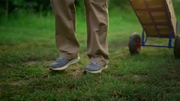 Farmer Legs Going Orchard Carry Agriculture Equipment in Eco Garden Plantation