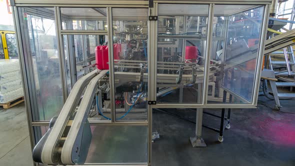 A Factory for Plastic Canister Production Timelapse Hyperlapse. The Conveyor in the Factory.