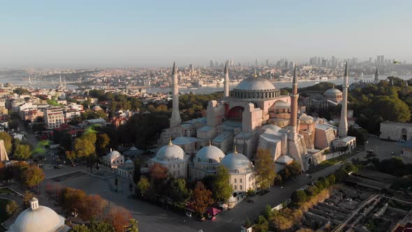 Hagia Sophia Holy Grand Mosque (Ayasofya Camii) with Bosphorus and city skyline on the background