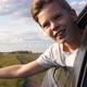 Teen Boy Looks Out the Car Window and Waves - VideoHive Item for Sale