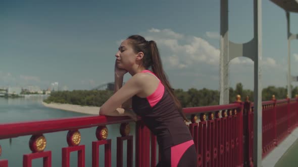 Fitness Woman Relaxing After Outdoor Training