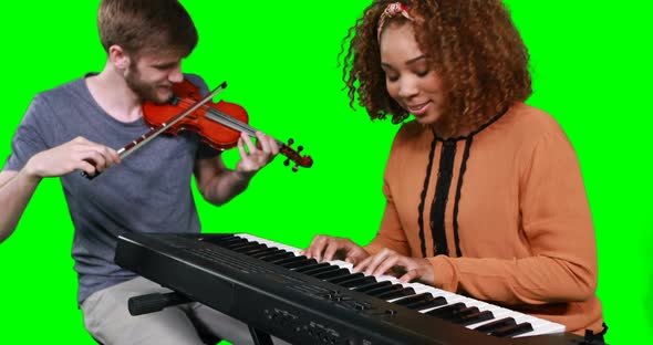 Musicians playing piano and guitar