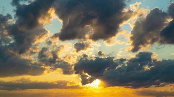 Clouds Fly Across the Sky at Sunset