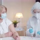 A Female Doctor is Preparing to Vaccinate a Patient - VideoHive Item for Sale