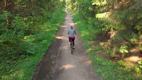 Young Cyclist Riding on a Nice Road