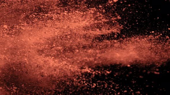 Super Slow Motion Shot of Cocoa Powder Explosion Isolated on Black Background at 1000Fps