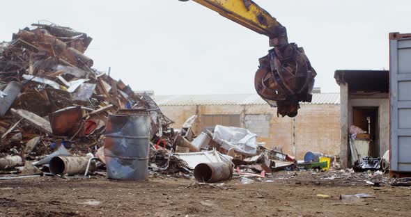 Excavator Machine Being Operated in The Junkyard 4k