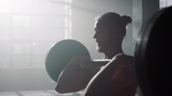 Man Lifting Weights During Workout