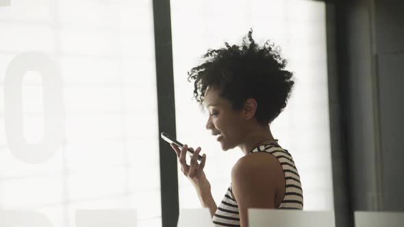 Young woman talking on cell phone