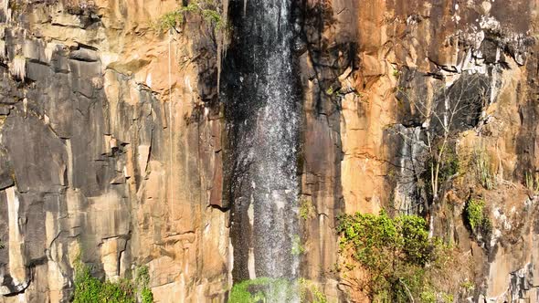 Slow motion waterfall at gorge canyons formation. Rural landscape.