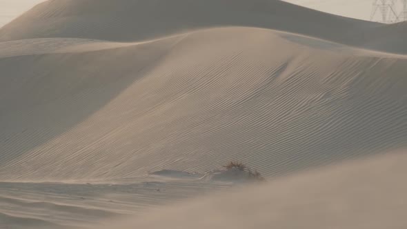 Sand Dunes in the Desert of Dubai During the Wind