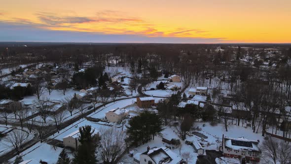 Aerial View Over the Private Town Residential Gardens a Orange Dramatic Sky During Sunset Over