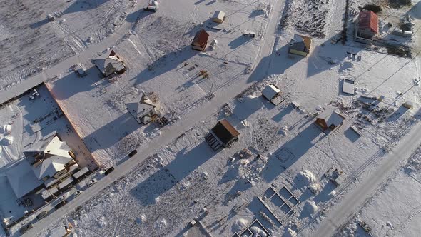 Top down Aerial view of winter cottage village. 02