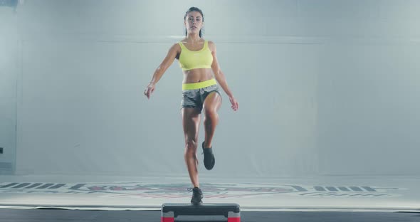 Athletic Woman Doing Step Up Leg Lifting