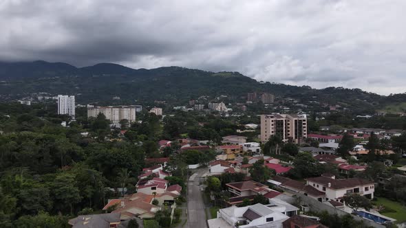 Beautiful aerial shot flying over San Jose in Costa Rica. Covid lockdown 2020