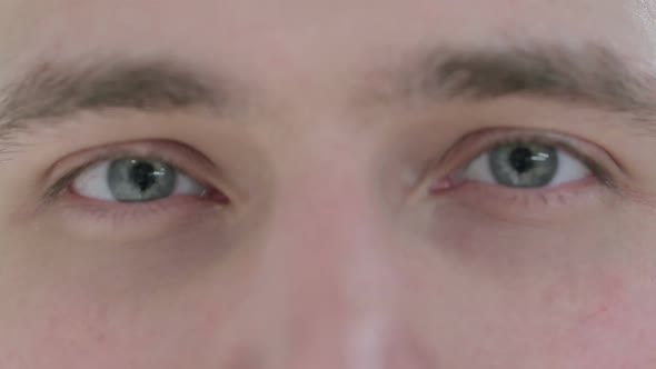 Macro Shot of Blinking Eyes of Young Man