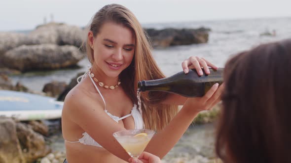 Woman Drinking Champagne Outdoors Friends Spend Time Together on Beach