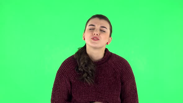 Cute Female Feels Very Bad, Her Stomach Hurts, Green Screen