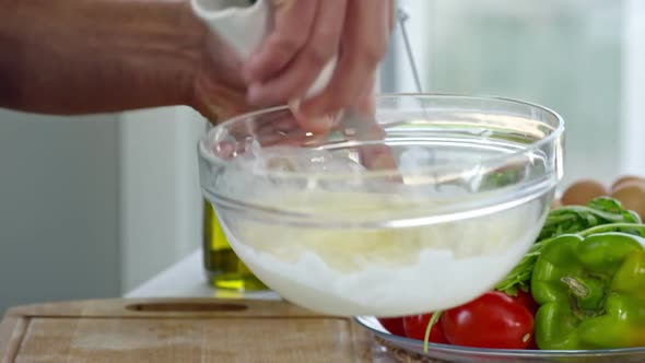 Cook Whisking Eggs