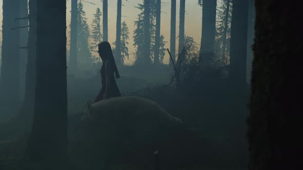 Girl walking in the forest