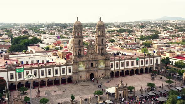 Drone flight over Plaza de las Americas with the Basilica of Zapopan