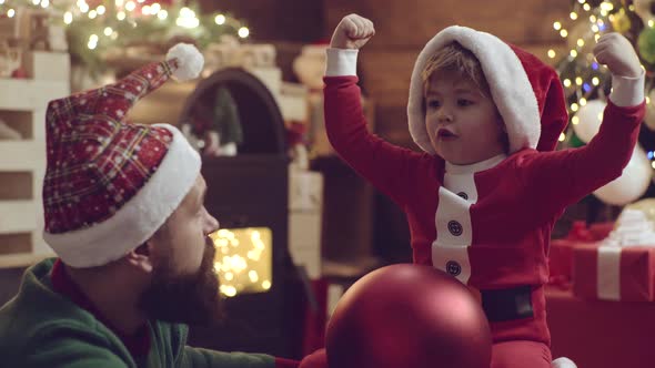 Happy New Year. Christmas for Father and Son. Dad and Child Boy Celebrate Xmas at Home. Family