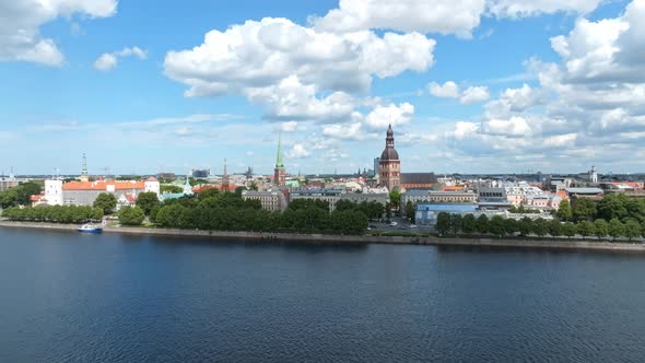 Beautiful Sunny Day with Clouds Going Over the Center of the City