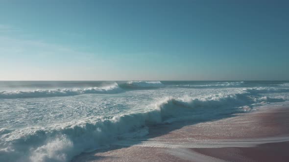 Stormy water of Atlantic Ocean, beautiful coastline, the crest of the wave crashing on the shore