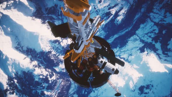 Futuristic Spaceship Near the Earth. Elements of This Image Furnished By NASA alt