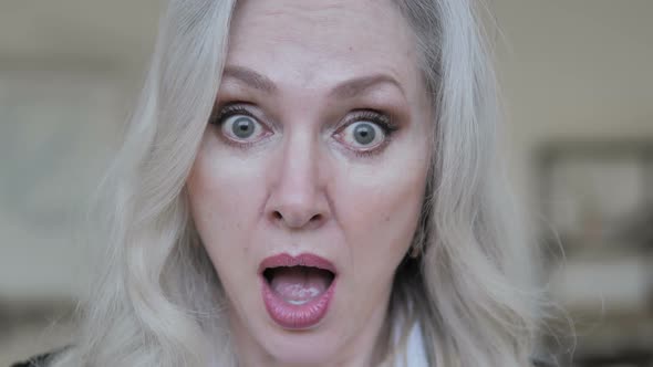 Shocked Aged Business Woman