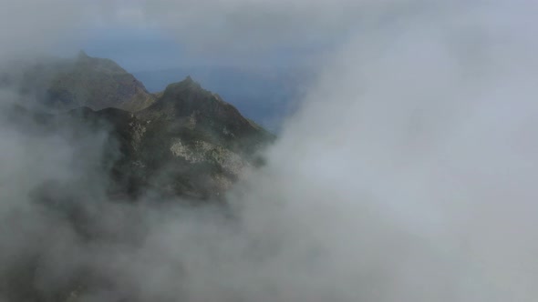 Drone flying into the clouds in Anaga mountains, Tenerife, Canary Islands, Spain