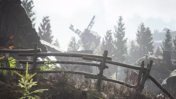 Old Traditional Wooden Windmill in the Forest alt
