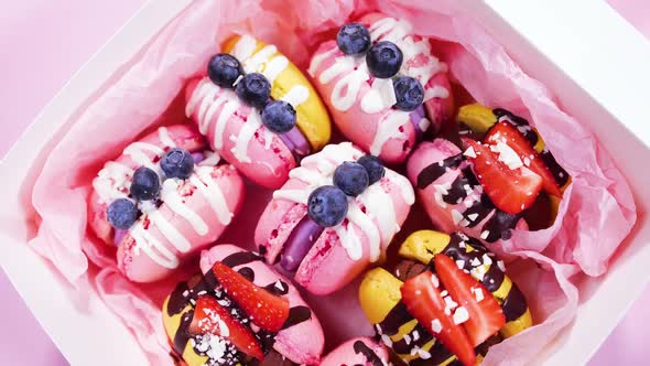 Macaroon in Box Handmade Beautiful Sweet Food Dessert with Fresh Strawberries and Blueberries