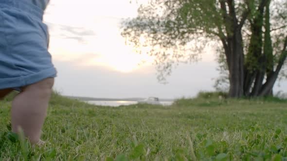Toddler and Woman Walking Barefoot alt