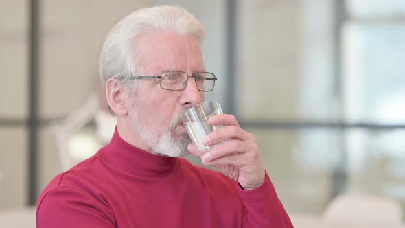 Healthy Old Man Drinking Water