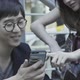 Man looking at smart phone with friend - VideoHive Item for Sale