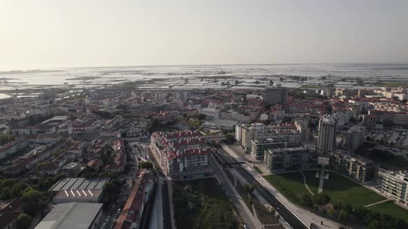 Cais da Fonte Nova, piers and Ria de Aveiro against cityscape. Aerial view
