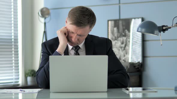 Businessman Sleeping at Work