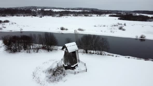 Old Mill on the River Bank in Winter Russian Wood Architecture Pushkin Mountains