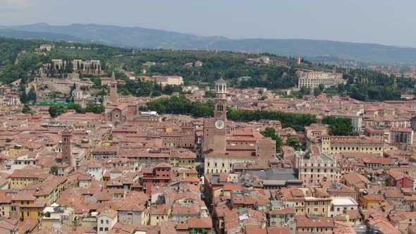 Drone approaching Piazza delle Erbe (Market square) in Verona city, Italy