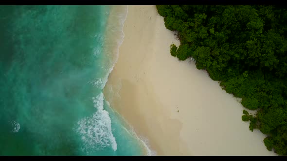 Aerial flying over scenery of tropical coastline beach journey by aqua blue lagoon with clean sandy 