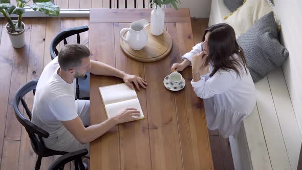 Young people have a talk at the table