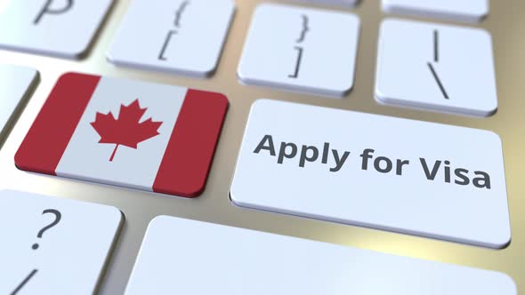APPLY FOR VISA Text and Flag of Canada on the Keyboard