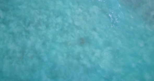 Luxury aerial abstract shot of a white sand paradise beach and turquoise sea background in high reso