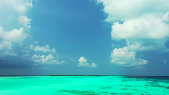 Luxury aerial travel shot of a summer white paradise sand beach and aqua turquoise water background 