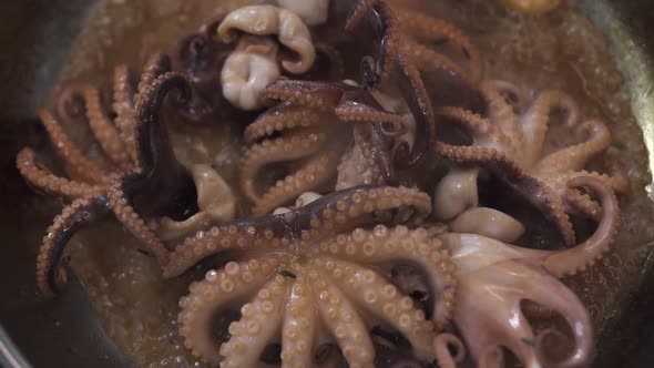 Delicious Octopuses Cooked in Boiling Oil with Spicy Broth