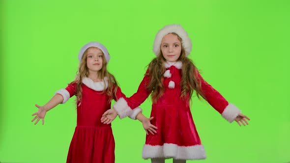 Children in Red New Year Costumes Are Dancing. Green Screen. Slow Motion
