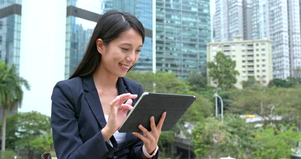 Asian Businesswoman use of tablet computer 