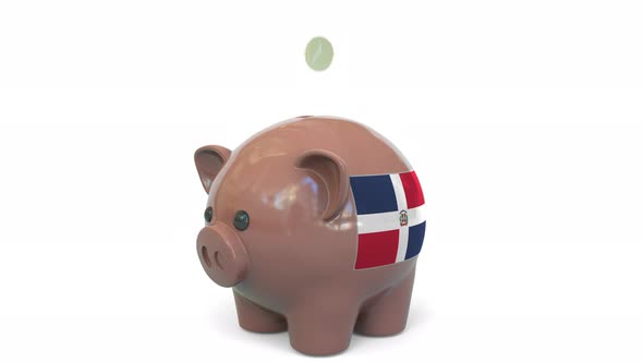 Putting Money Into Piggy Bank with Flag of the Dominican Republic